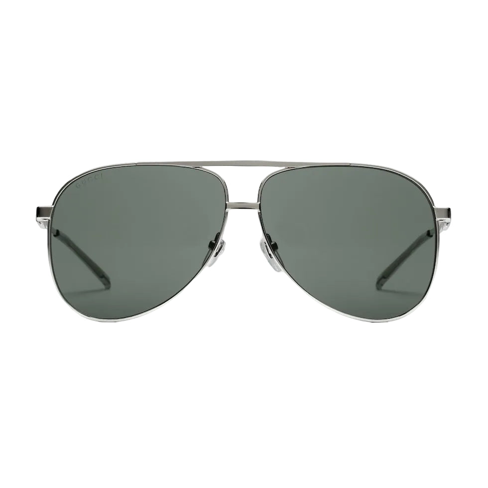 Aviator sunglasses with dark lenses on a light gray background