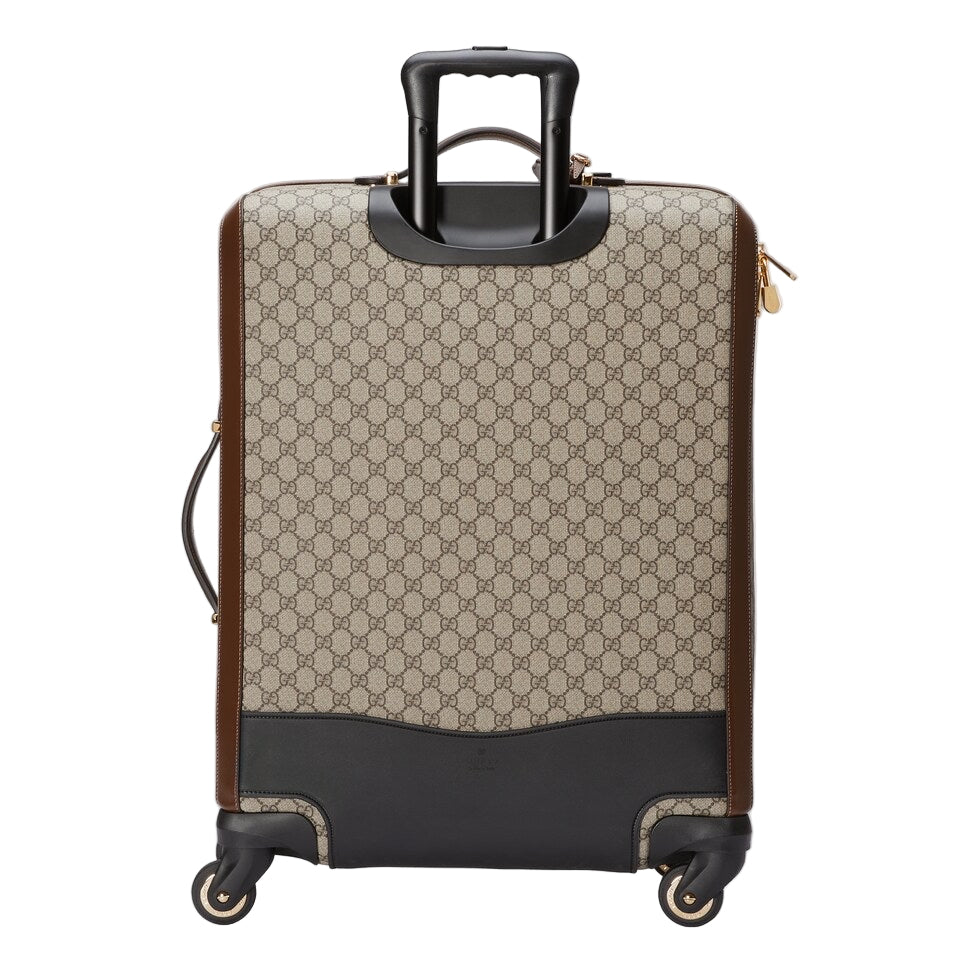 Patterned suitcase with black accents on a light gray background