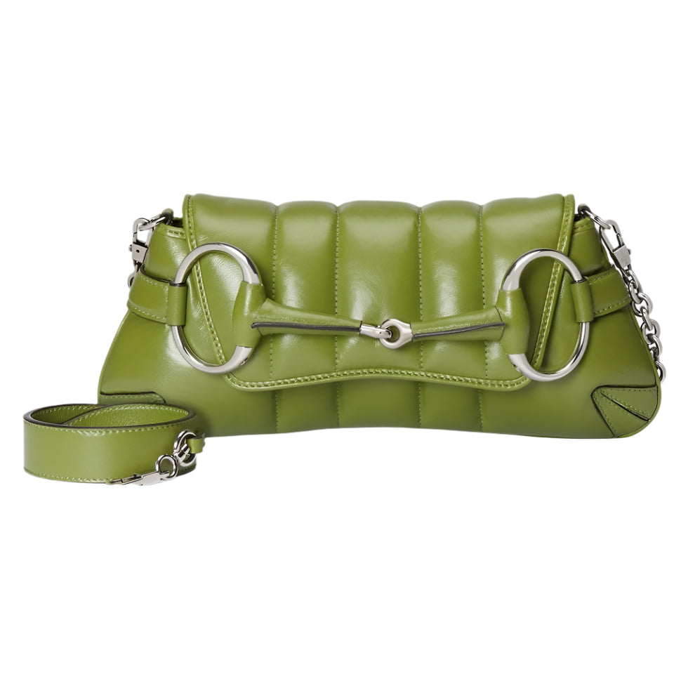 Green quilted Gucci Horsebit handbag with silver hardware on a light gray background