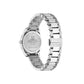 Silver Gucci watch on a light gray background