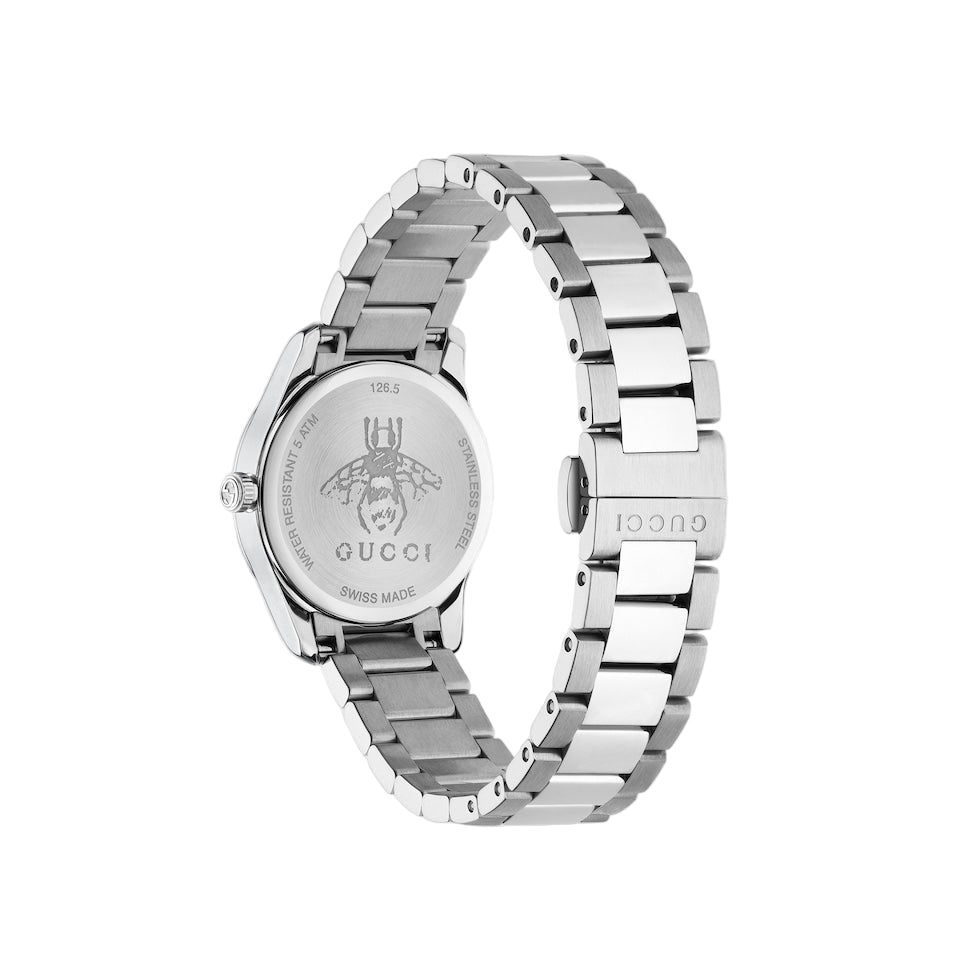 Silver Gucci watch on a light gray background