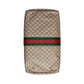 Beige handbag with a red and green stripe on a light gray background