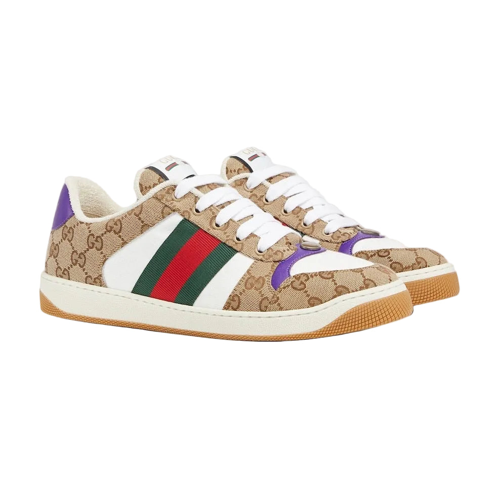 Beige Gucci sneakers with multicolor stripes on a light gray background