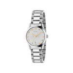 Silver Gucci watch with star design on a light gray background