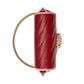 Red handbag with gold chain strap on a light gray background