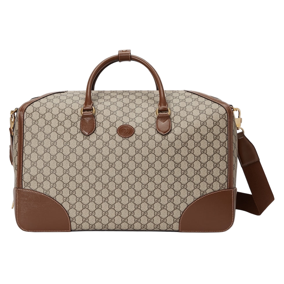 Beige and brown patterned travel bag with matching straps on a light gray background