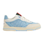 Sneaker with blue and beige design on a light gray background
