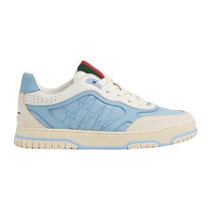 Sneaker with blue and beige design on a light gray background