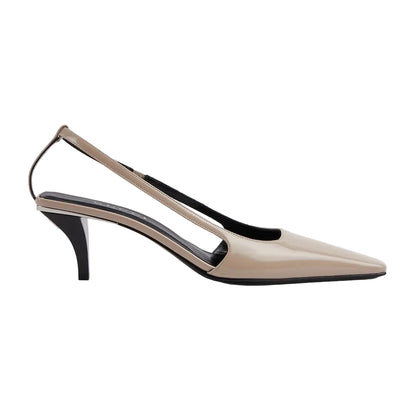 Beige slingback shoe with black heel and inner lining on a light gray background