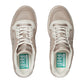 Pair of Gucci sneakers on a light gray background