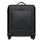 Black Gucci suitcase with a geometric pattern on a white background