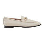 Beige loafer shoe on a light gray background