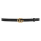 Black belt with gold double G buckle on a light gray background