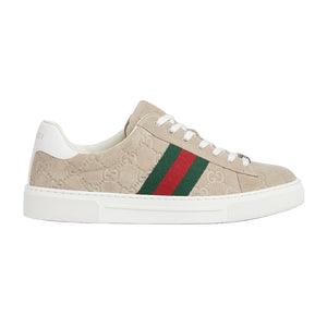 Beige Gucci sneaker with green and red stripe on a light gray background