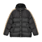Black Gucci puffer jacket with beige accents on a white background