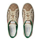 Pair of Gucci sneakers with patterned design on a white background