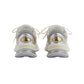Pair of Gucci sneakers on a light gray background