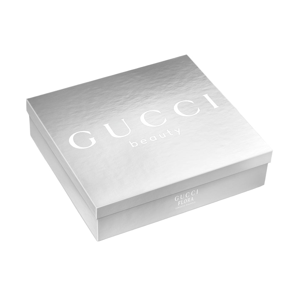 Gucci beauty box on a light gray background