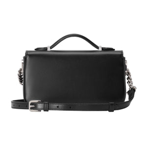 Black leather handbag with chain detail on a light gray background