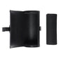 Black leather wallet with a cylindrical pouch on a light gray background