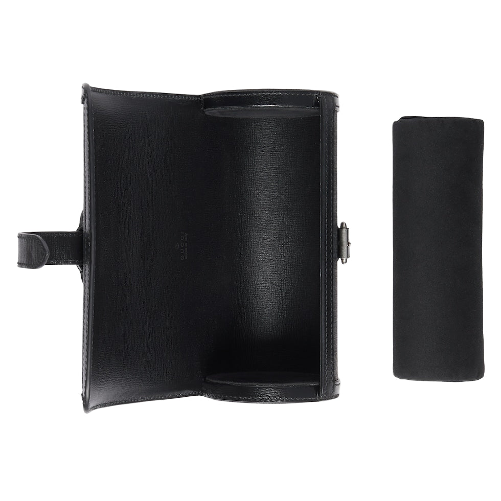 Black leather wallet with a cylindrical pouch on a light gray background