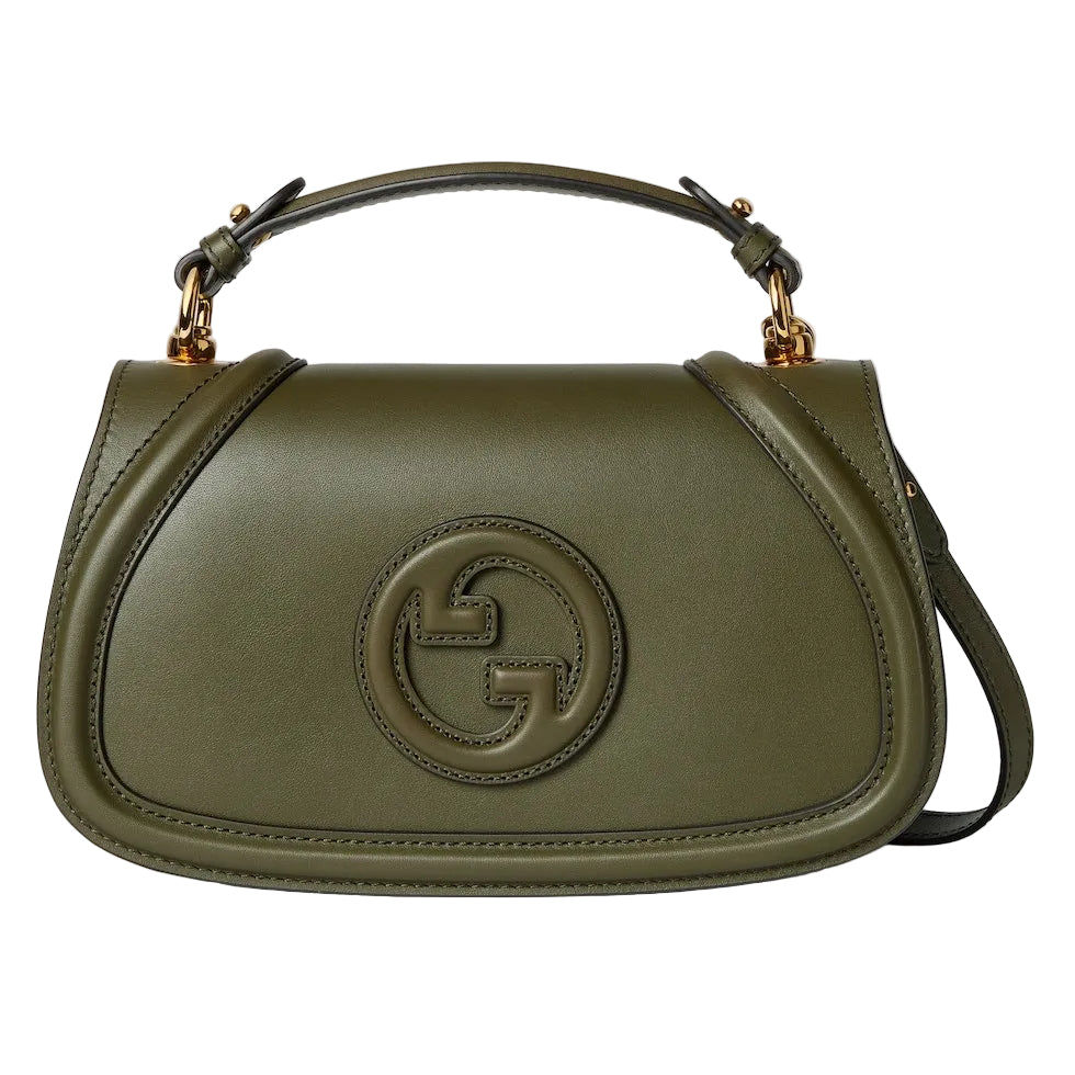Green handbag with a brand logo on a light gray background