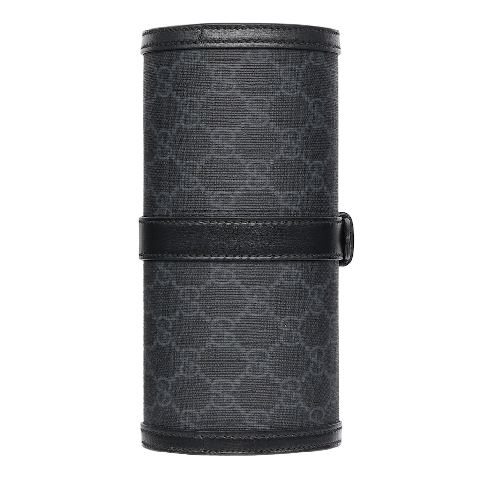 Black cylindrical case with patterned design on a light gray background