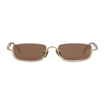 Sunglasses with gold frame and brown lenses on a light gray background