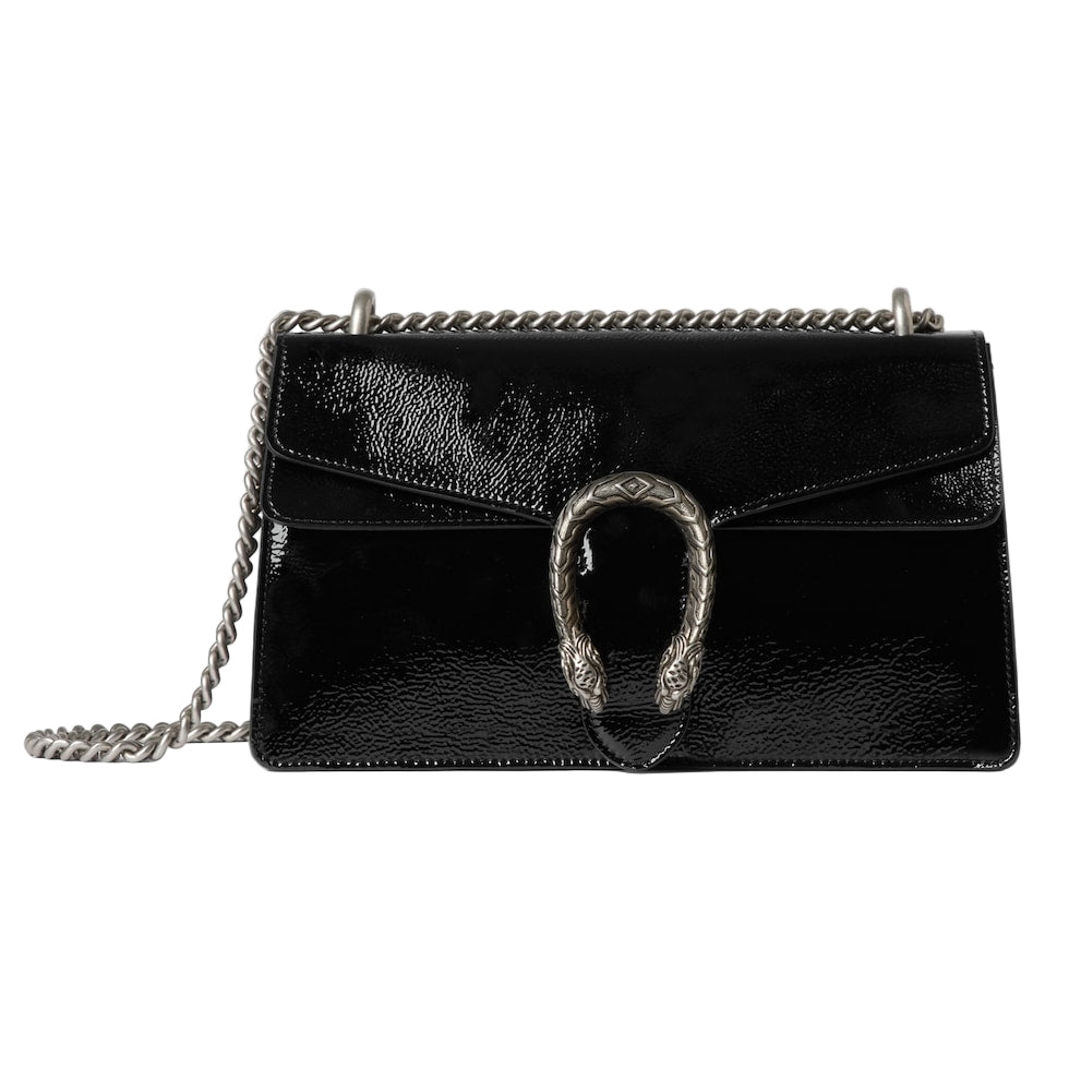 Black leather handbag with chain strap on a light gray background