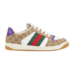 Gucci sneaker with brown pattern, white, red, and green stripes on a light gray background