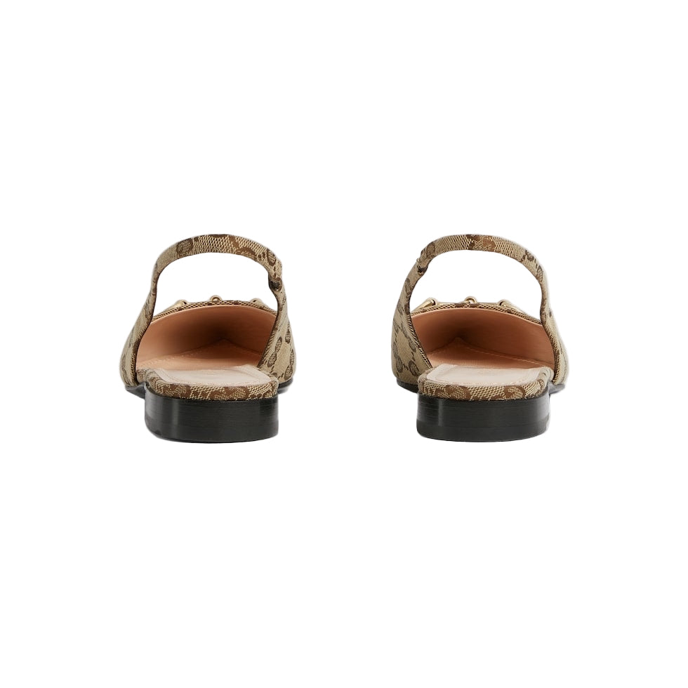 Pair of cork sandals on a light gray background