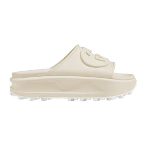 Beige slide sandal on a light gray background