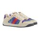 Beige sneaker with colorful stripes on a light gray background