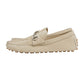Beige loafer shoe on a light gray background