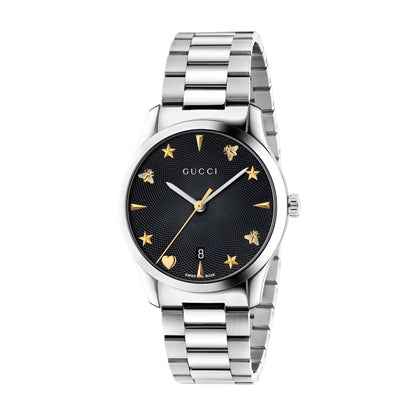 Gucci watch with black dial and silver bracelet on a light gray background
