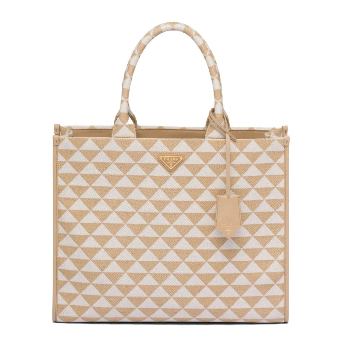 Prada tote bag featuring a beige and white geometric triangle pattern, with a small gold-tone Prada logo plaque on the front and a matching leather hangtag.