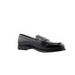 Black loafers on a white background