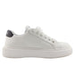 White sneaker on a light gray background