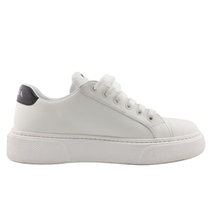 White sneaker on a light gray background