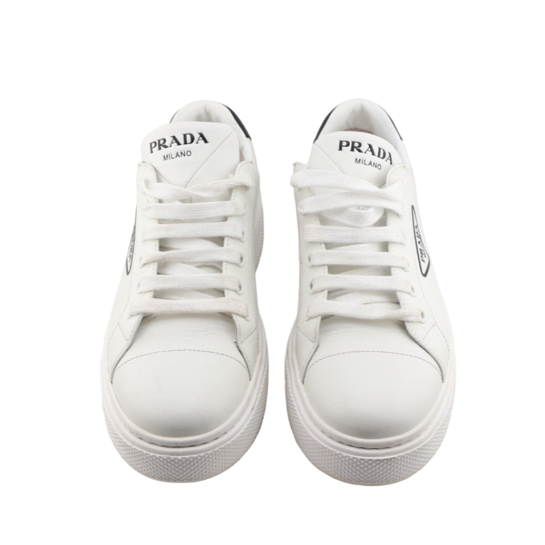 White Prada sneakers on a white background