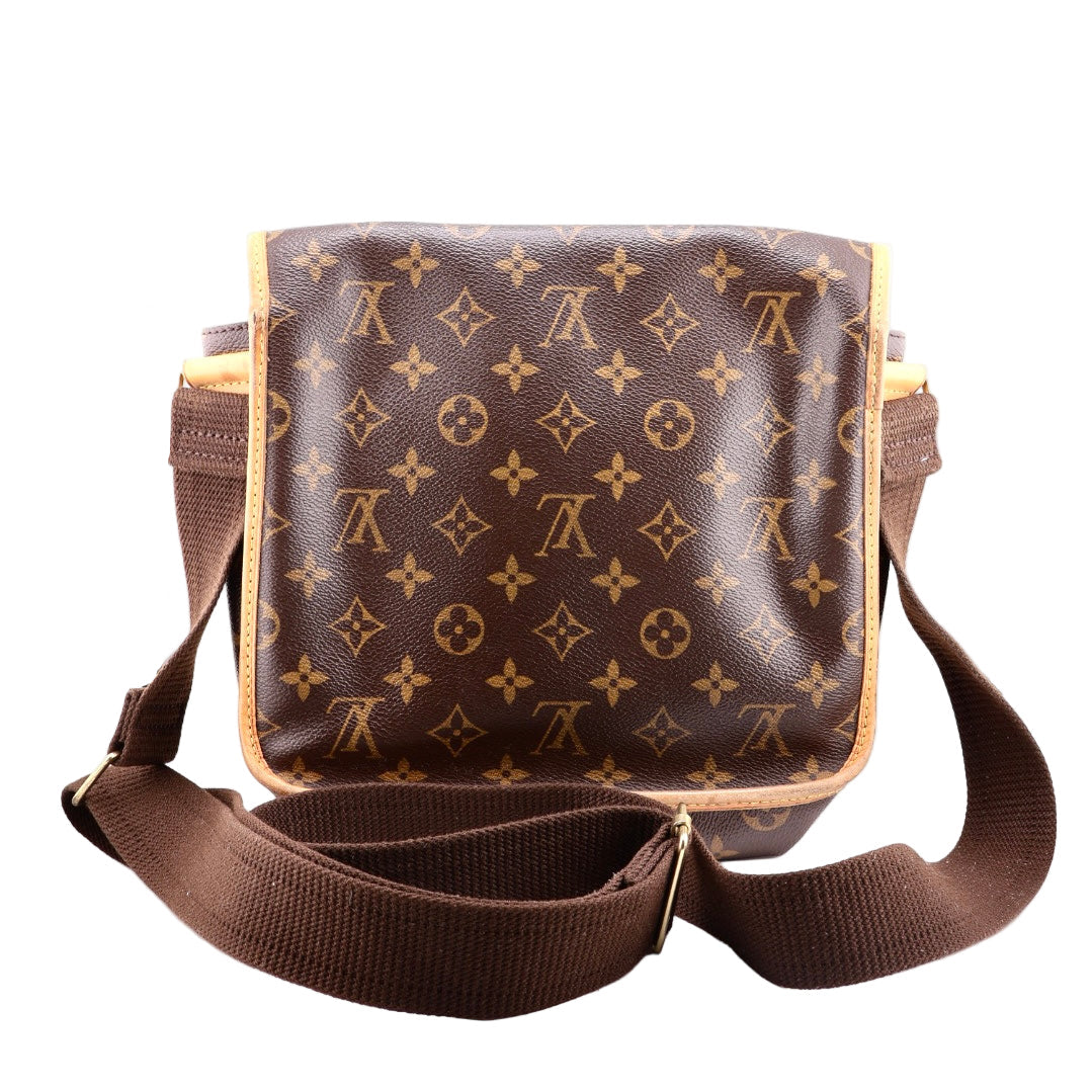Brown LV  leather bag with a prominent pattern on a white background