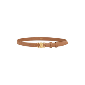 Tan belt with gold buckle on a light gray background