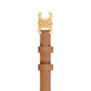 Tan leather belt with a gold buckle on a light gray background