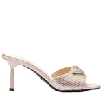 High-heeled sandal with embellishments on a white background