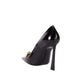 Black high-heeled shoe on a light gray background