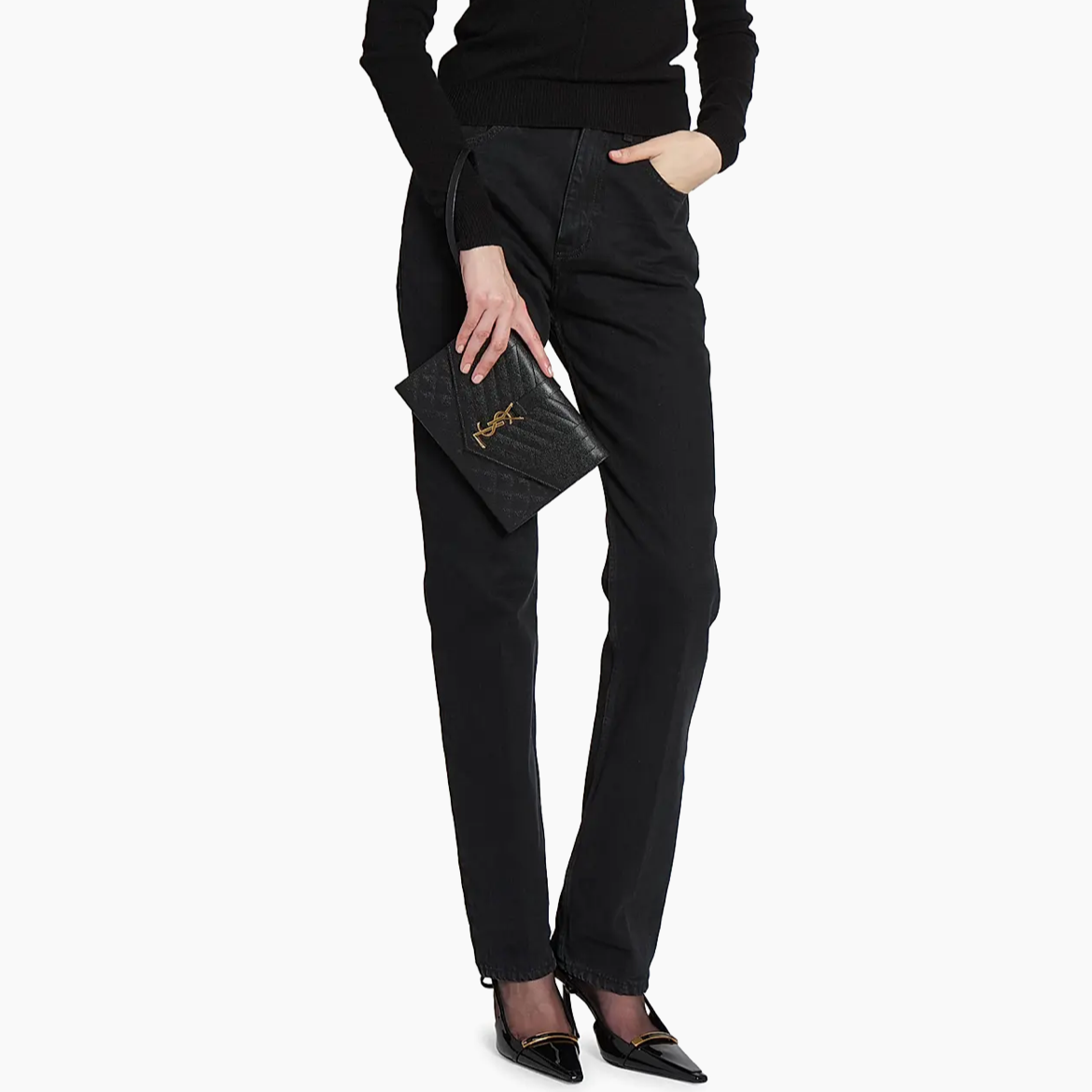 Woman wearing a black outfit with a brand logo on a white background