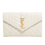 White envelope clutch with gold YSL logo on a light gray background