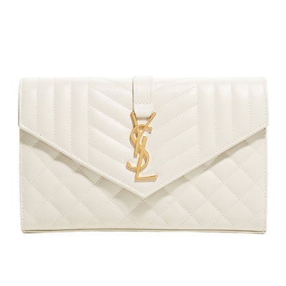 White envelope clutch with gold YSL logo on a light gray background