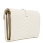 White quilted clutch bag on a light gray background