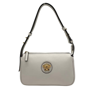 Light gray handbag with a brand logo on a white background
